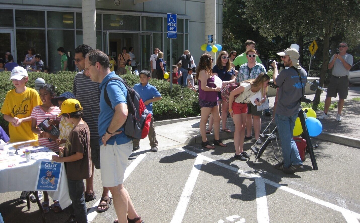 large crowd of people of all ages attending Cal Day