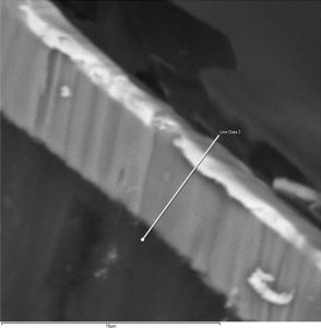 cross section of a multilayer thin film coating examined on the SEM