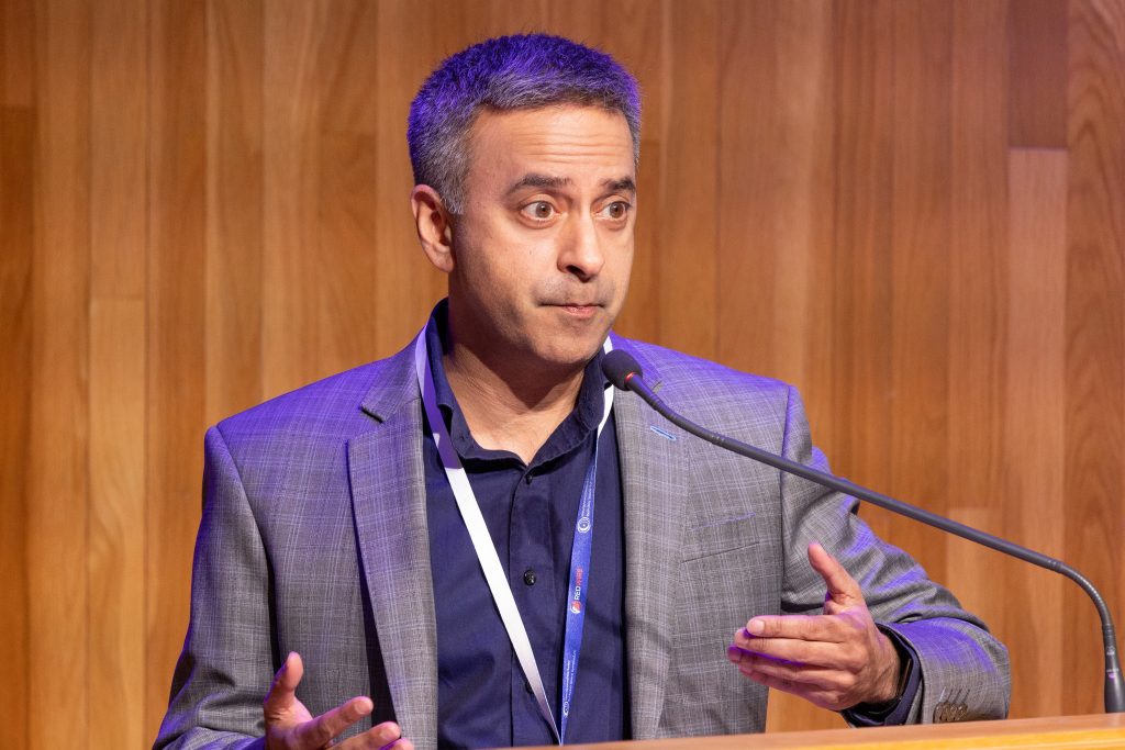 Abhishek Tripathi, director of mission operations at SSL, moderating a panel discussion at the Berkeley Space Symposium 2025.