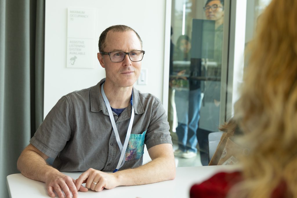 Josh Forgione, aerospace engineer at SSL, mentoring at Berkeley Space Symposium 2025.
