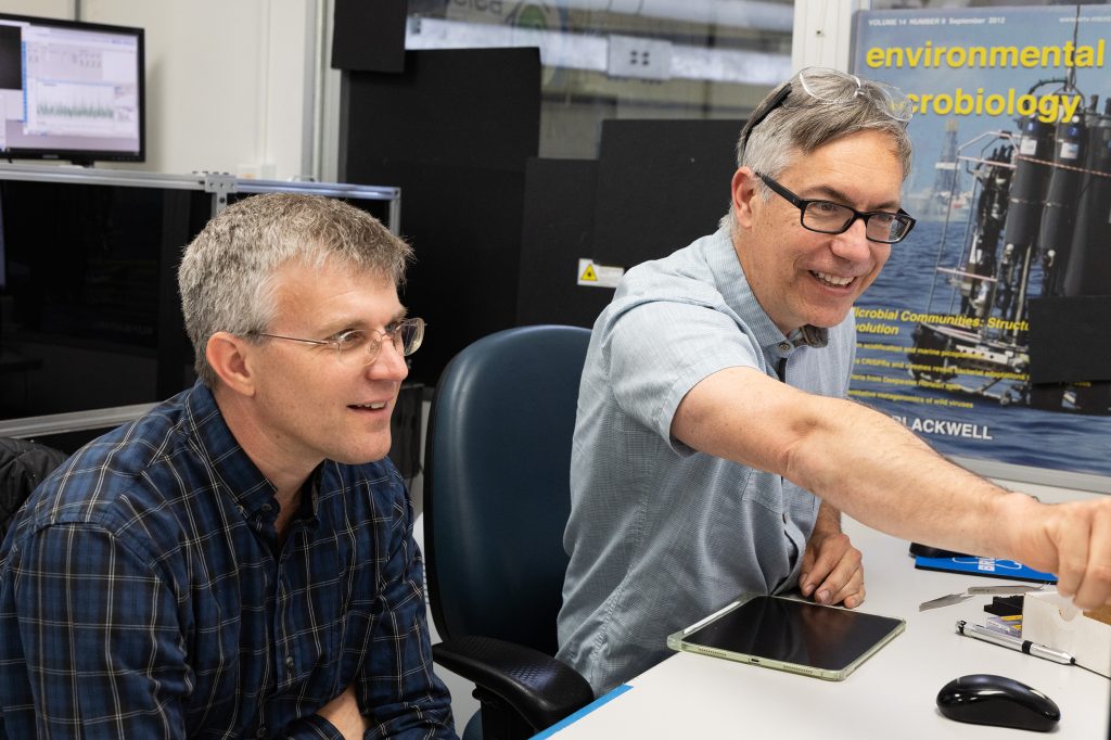 Zack Gainsforth(left) and Hans A. Bechtel(right) at the Lawrence Berkeley National Laboratory's Advanced Light Source (Credit: UC Berkeley SSL, Alan Toth)